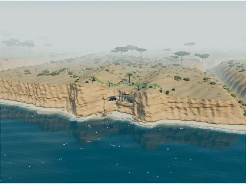 The cave house in its cliff from far out over the Pacific, with the mesa, its planting and the coast running on into the haze
