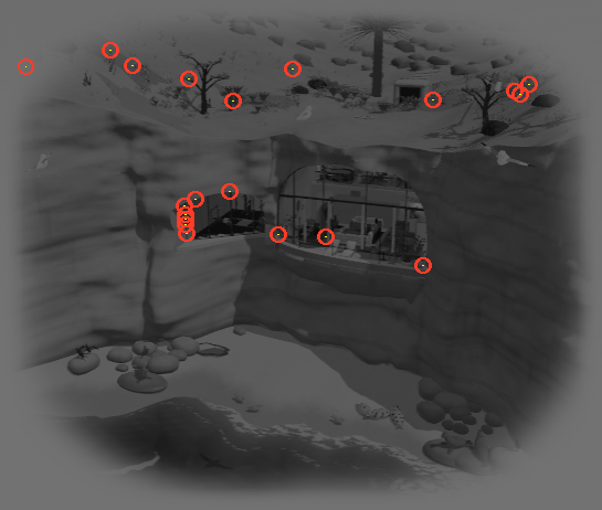 The same frame in gray with small red rings on the clifftop planting and the edges of the glass front, marking the 39 pixels the draw grouping changed